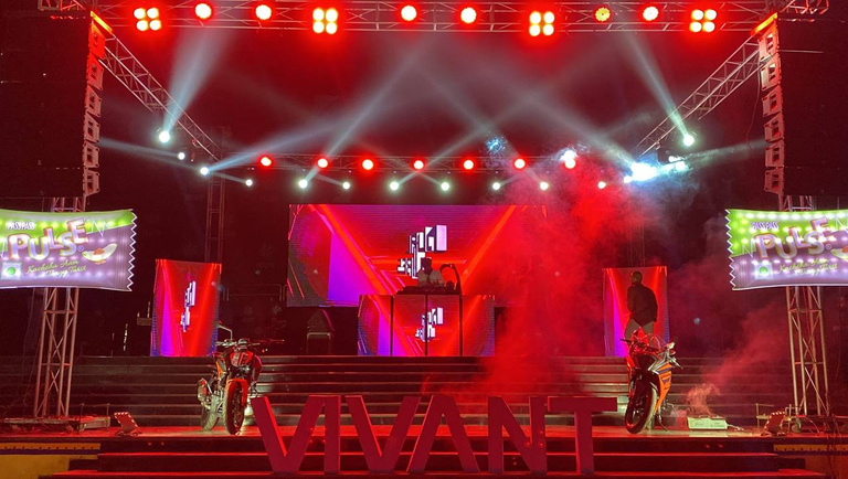Vivant launch — moving-light stage with hero product reveal